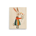 Load image into Gallery viewer, bunny, clad in a colorful striped dress that whispers of sunny days and joyful picnics in the park. nursery decor
